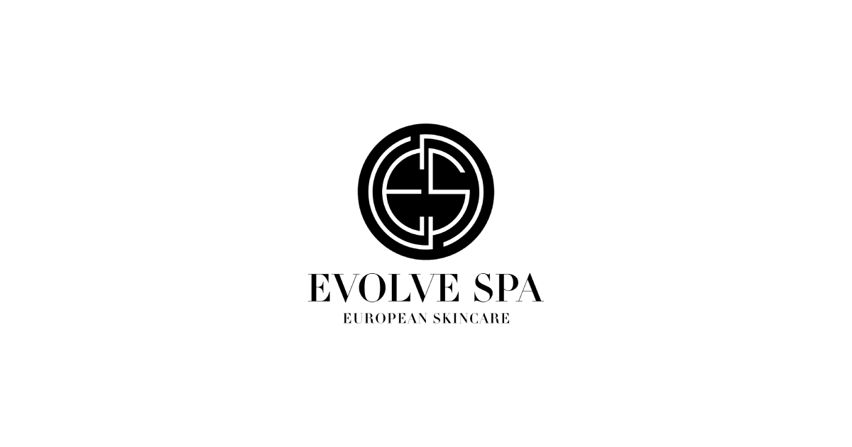 Clean, professional medical spa treatment room with neutral tones at Evolve Spa in Great Neck